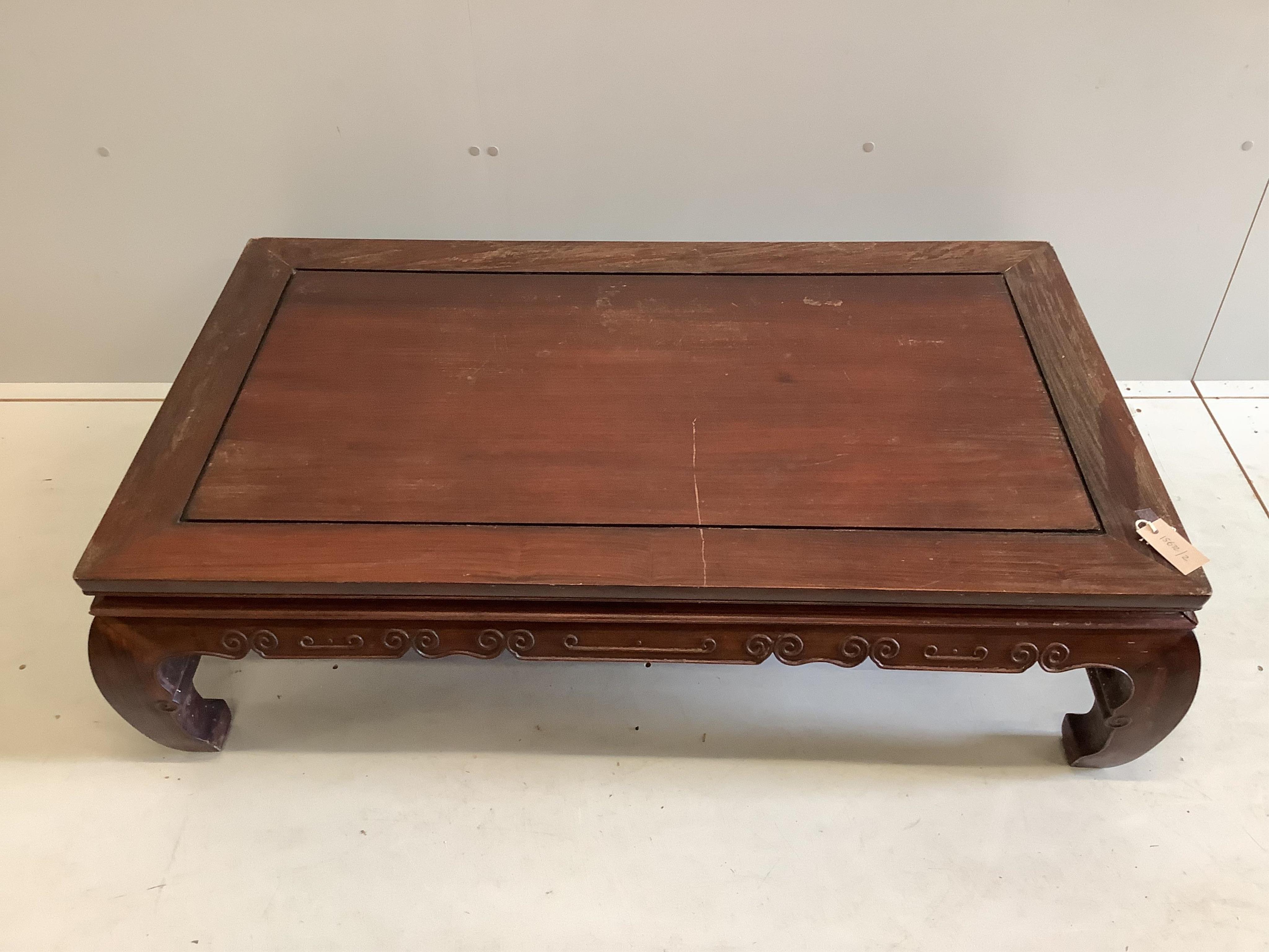 A Chinese rectangular hardwood coffee table, width 122cm, depth 72cm, height 36cm. Condition - fair